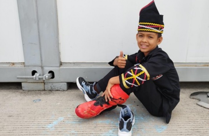 Rayyan Dika, Bocah Pacu Jalur yang Buka Sprint Race Mandalika dan Dapat Sepatu dari Marc Marquez