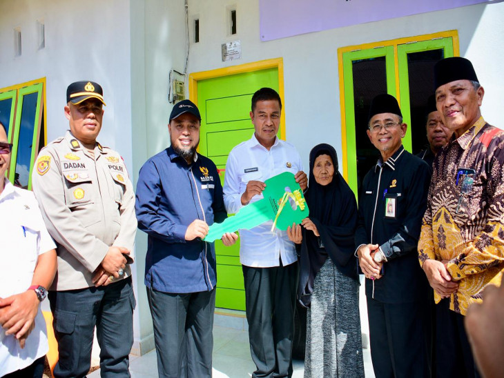 Bupati Kampar Resmikan Rumah Layak Huni di Ganting Damai