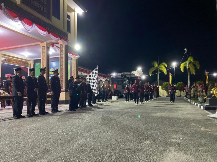 Di Mapolres Kampar, Wabup Misharti Lepas Pawai Obor Malam Taptu