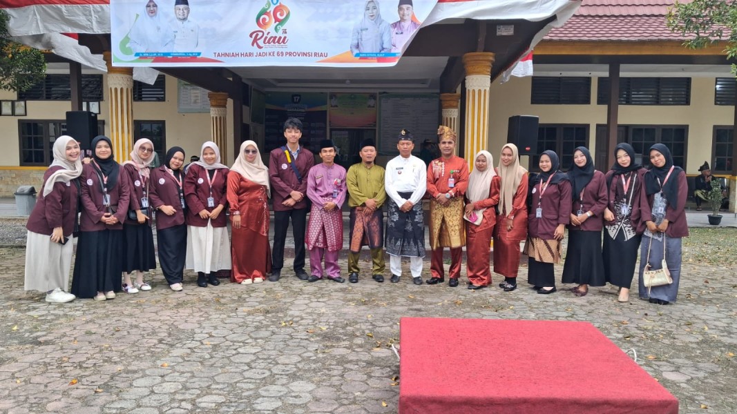 Pj Penghulu Kampung Minas Barat Riduan Hadiri Upacara HUT ke-69 Provinsi Riau di Kecamatan Minas