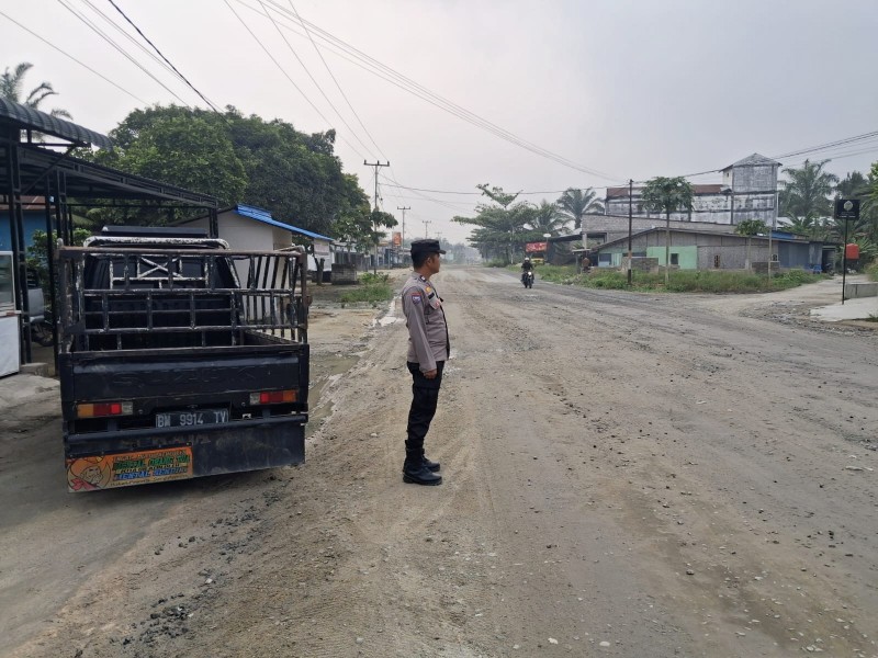 Jaga Keselamatan Pelajar dan Masyarakat, Personel Polsek Pujud Hadir Lewat PKM Pagi