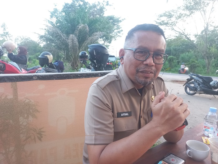 Wisman Berbikini di Danau Rusa Bukan Kesengajaan, Kadispar Kampar Sebut Bukti Wisata Kampar Mendunia