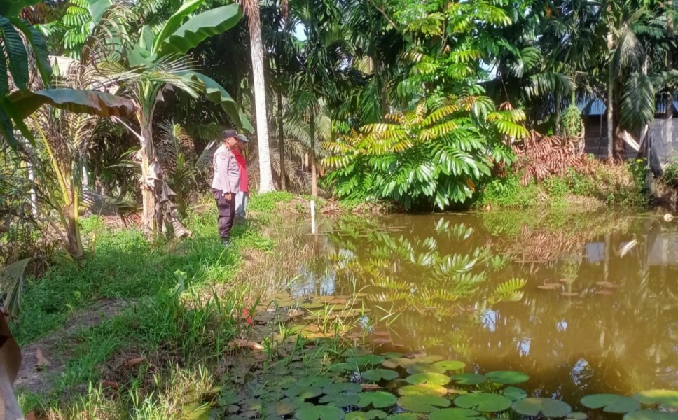 Dukung Ketahanan Pangan Nasional, Bhabinkamtibmas Desa Jatirejo Sambangi Pembudidaya Ikan Nila