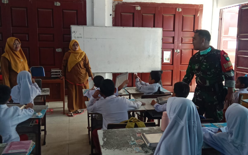 Babinsa Koramil 01/Dumai Kawal Distribusi Makanan Bergizi Gratis kepada 2.118 Penerima Manfaat