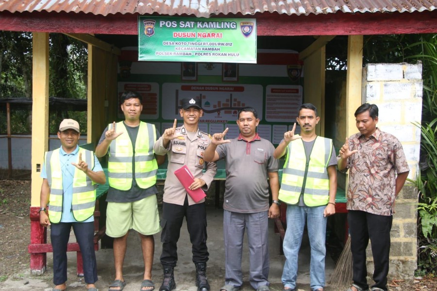 Bupati Anton Ajak Seluruh Desa di Rohul Contoh Bhabinkamtibmas Koto Tinggi dalam Penguatan Satkamling