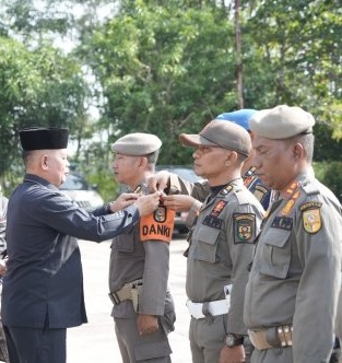 Tim Kerja Satpol PP Kuansing Mulai di Kukuhkan dalam Pengamanan Event Nasional Pacu Jalur 2026.