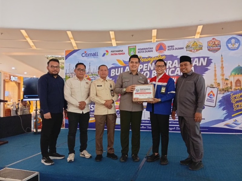 Pertamina Patra Niaga Kilang Dumai Salurkan Bantuan 500 Masker KN95 dan 350 Susu Kaleng untuk Dukung Kesiapsiagaan Dampak Asap Karhutla