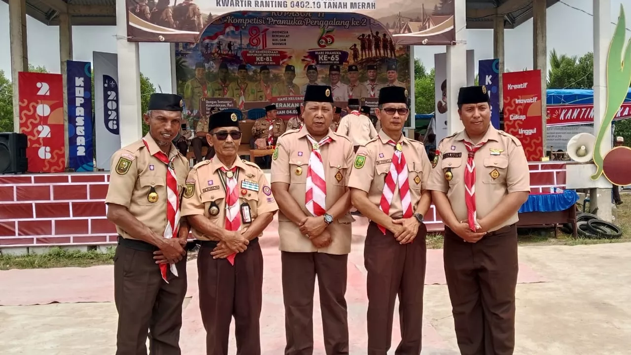 Dedikasi Tanpa Batas H. Taufik Hidayat, S.H., M.A.P. Dua Periode Memimpin dan Membawa Gerakan Pramuka Tanah Merah ke Puncak Kejayaan