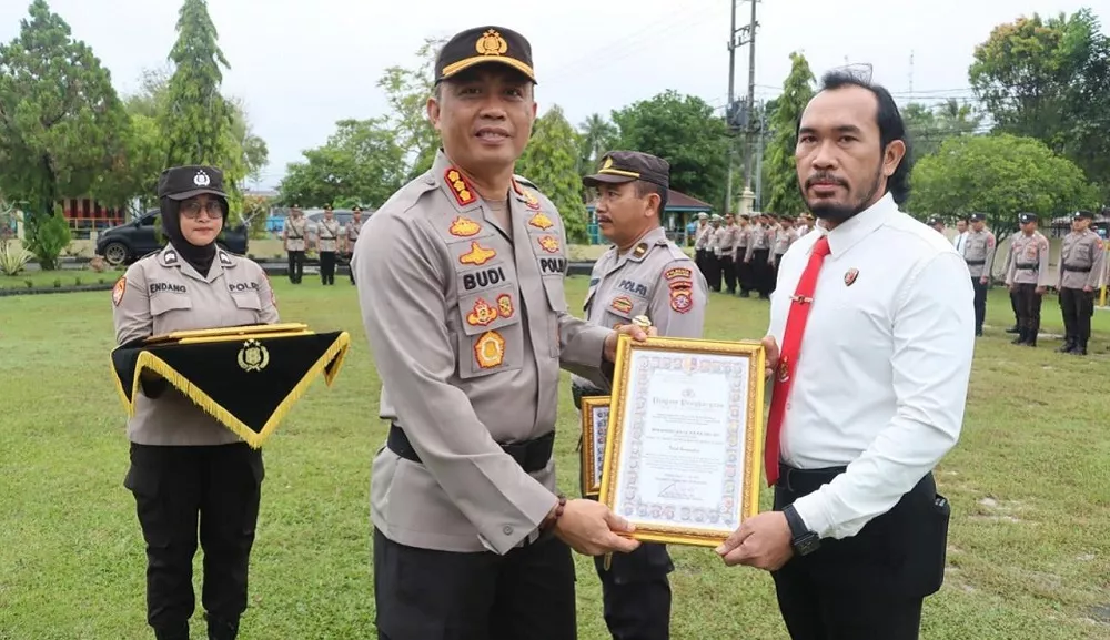 Gelarnya Sepanjang Rambutnya, Helmi Pulang ke Sampit Jadi Kapolsek Baamang