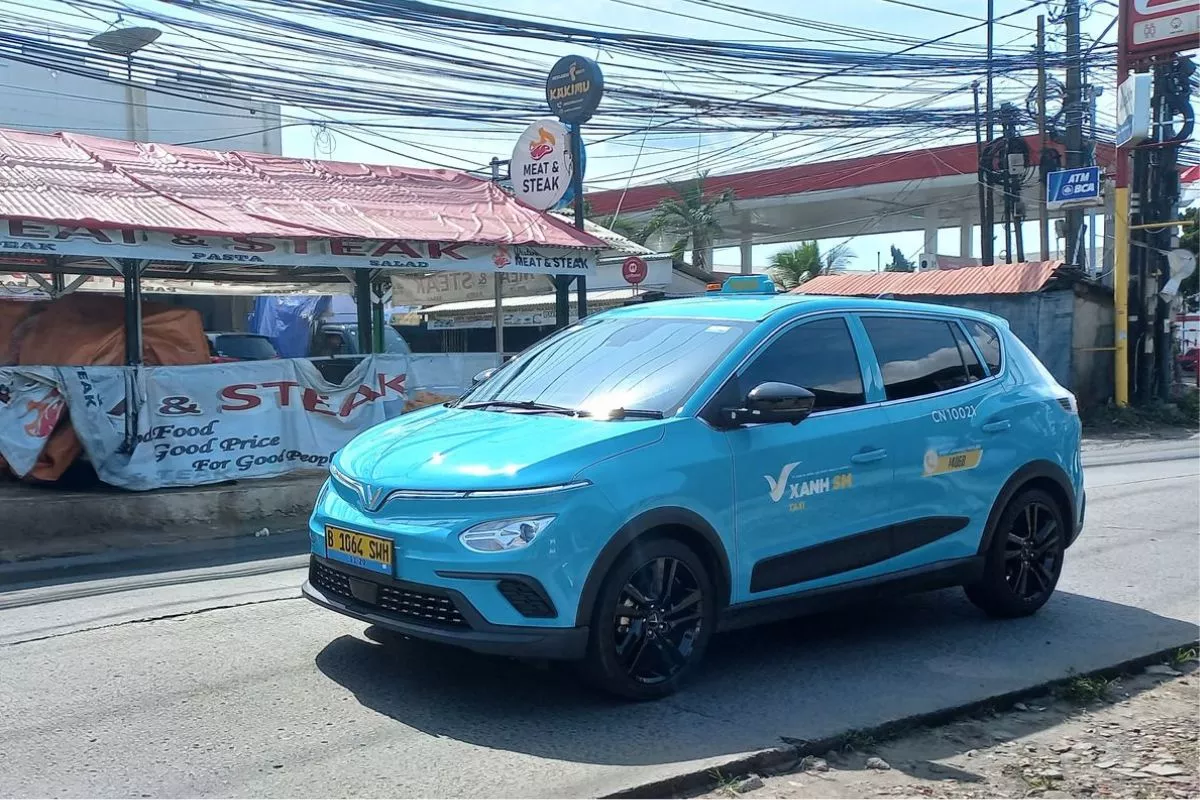Usai Putus Kontrak dengan GoTo, TAXI Lirik Taksi Listrik Green SM