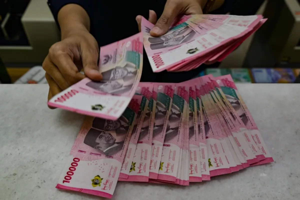Pergerakan Rupiah Fluktuatif, Sempat Melemah ke Rp17.984 per Dolar AS