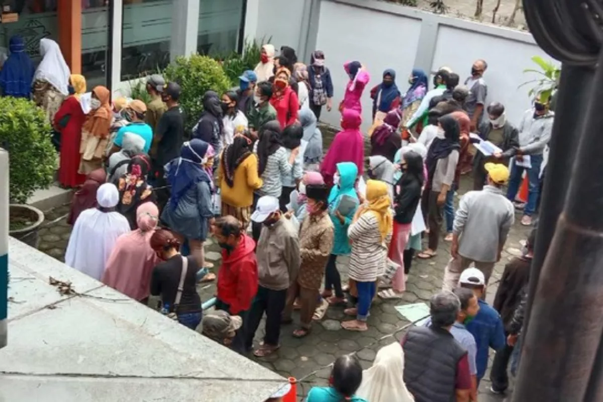 Cukup Pakai NIK, Begini Cara Cek Status Pencairan Bantuan Sosial