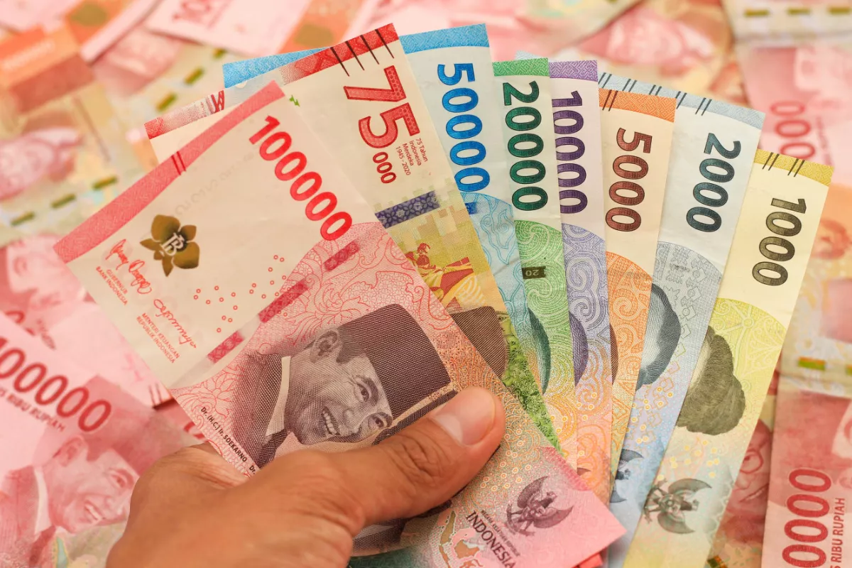 Rupiah Dibuka Menguat 0,03 Persen ke Level Rp18.055 per Dolar AS