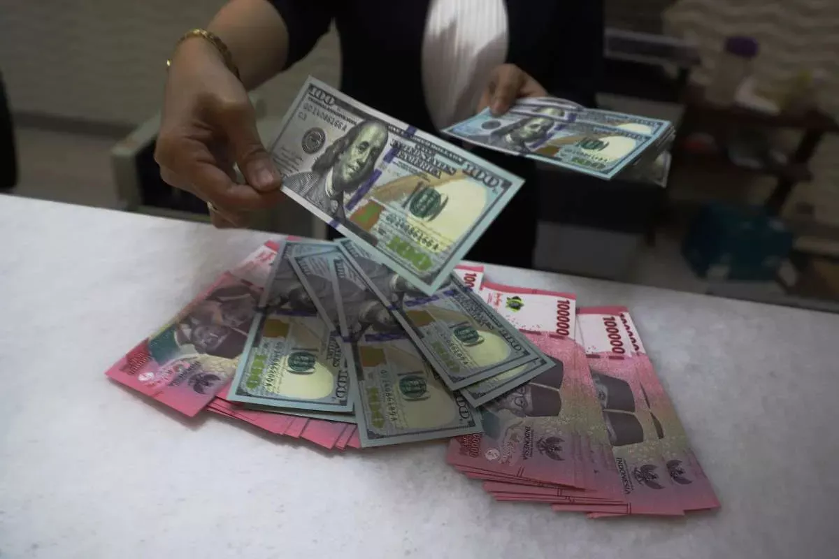Nilai Tukar Rupiah Menguat Terhadap Dolar AS Usai Suku Bunga BI Ditahan